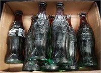 Old full Coca Cola Bottles