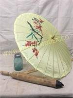 Pair of vintage wood handle Chinese umbrellas
