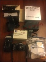 Large lot of camera supplies/ lenses- Minolta cam