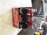 six pack of 1996 olympic coke bottles