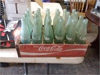 coke tray full of old coke bottles