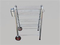OIL CAN RACK WITH ATTACHED HOLDER