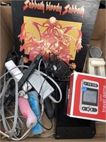 Box of Wii controllers Black Sabbath album etc
