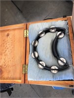 Tambourine in wooden case