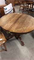 SOLID OAK CLAWFOOT DINING TABLE