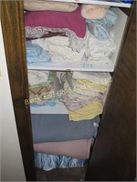 Three Shelves Assorted Sheets & Blankets