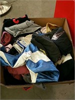 Box of t-shirts and yamakas