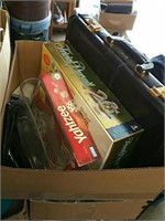 Box of games on briefcase