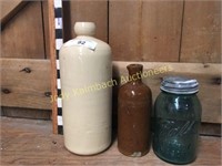 Pair of antique crock bottles