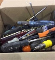 A box of screw drivers