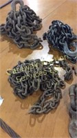 Three metal tow chains