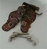 Hubley and Star cap guns and double holster