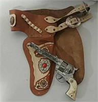 Hubley Cowboy cap gun and double holster