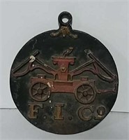 Fireman's cast iron pumper plaque
