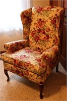 Floral pattern winged back chair