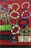 Tray lot of 13 beaded bracelets, natural shell