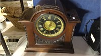 Antique carved wood case mantle clock, nice black