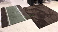 Two rugs with rubber backing just wrinkled,  look