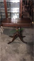 Mahogany pedestal game table with storage, 29 x