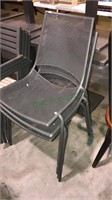 Set of three metal mesh seat chairs that stack