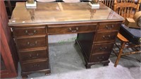 Mahogany eight drawer kneehole desk with a fitted