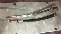 Sword and scabbard, about 38 inches long, made in