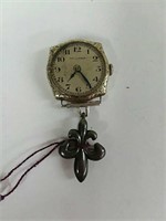 Hallmark Watch with a pendant