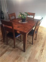 Dining room table with four chairs