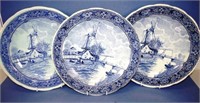 Three blue & white Delft wall chargers