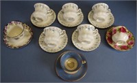 Eight assorted coffee cups and saucers