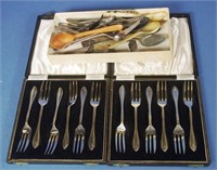 Two cased sets matching silver plated cake forks