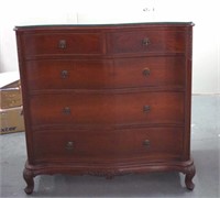 Vintage serpentine front chest of drawers