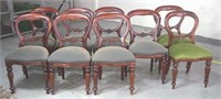 Nine Victorian style mahogany balloon back chairs