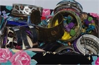 Box with large quantity of costume bracelets