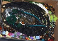 Box with quantity of costume necklaces