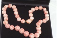 Good boxed pink coral graduated bead necklace