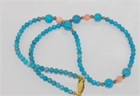 Stone set necklace in pink & blue colours