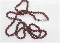 Long garnet round bead necklace