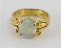 Solid opal ring set in gold plate