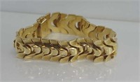 Articulated gold bracelet marked 14K
