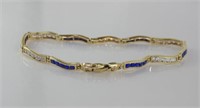 14ct yellow gold bracelet with blue gemstones