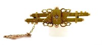 Vintage 15ct gold brooch with diamond