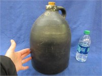 old black 2 gallon stone jug