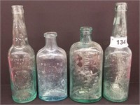 Group of Early Bottles, All with Embossing