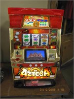 Eleco LTD. Azteca slot machine w/ coins. WORKS