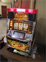 Eleco LTD. Outlaw slot machine w/ coins. WORKS