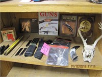 4 Gun books, 4 mags, gun cleaning rod,