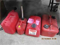 4 gas cans, 1 metal/3 plastic