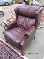 Maroon leather recliner w/ carved claw &
