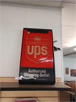 Lighted UPS authorized shipping Outlet sign